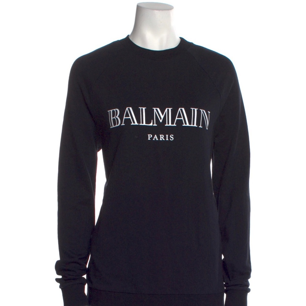 • Balmain Sweatshirt
• Black
• Graphic Print
• Long Sleeve with Crew Neck